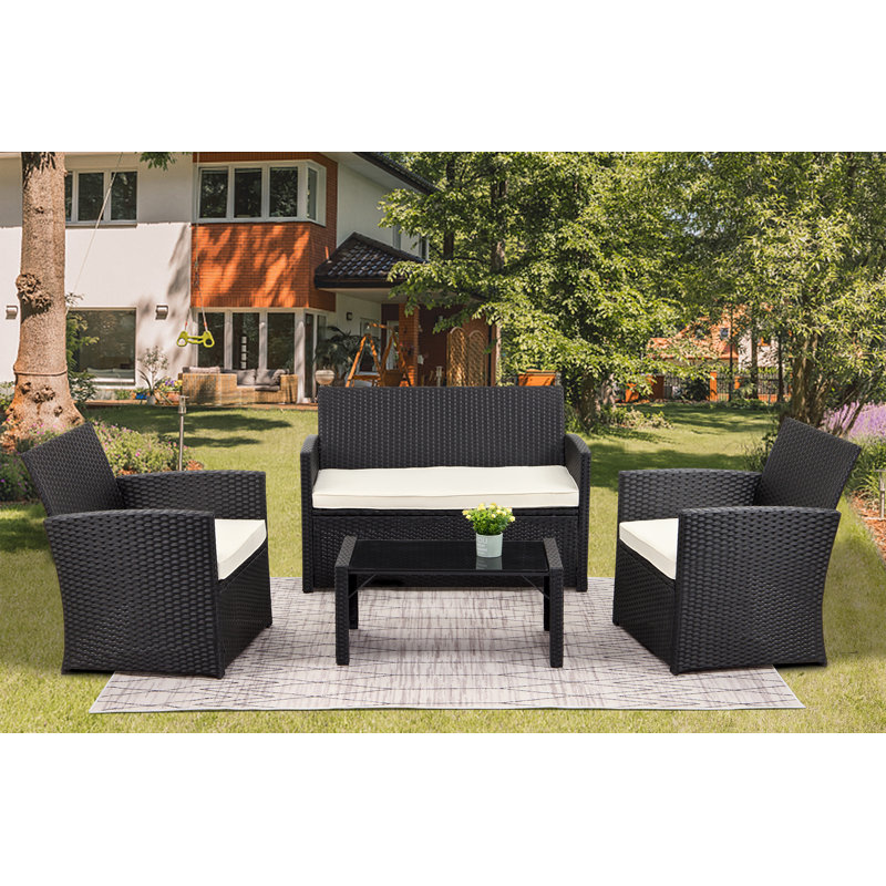 Latitude Run® Annorah 4 Piece Rattan Sofa Seating Group with Cushions